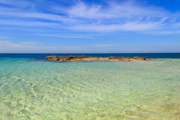 Golden sand, crystal clear sea and freshwater springs: Lido Marini welcomes bathers to enjoy the sun or explore the shallow water. Lido Marini beach is a long beach with fine sand overlooks a crystal clear sea, with shallow water almost sandy and embellished with low cliffs easy to reach: it stretches for more than two kilometres in the area of the municipalities of Salve and Ugento in Salento. Along the rocky coast south of the marina, water becomes suddenly cold and calm, thanks to the water springs which come out of the earth.