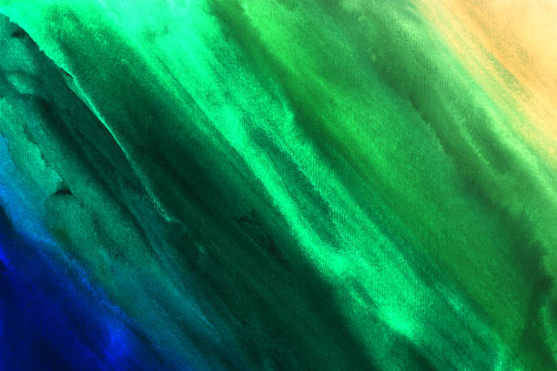 istock Watercolor gradient background from blue through green to yellow color 1206480043