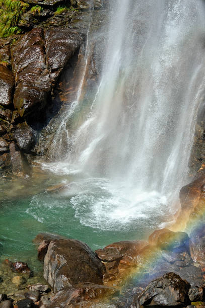 istock Waterfall in the middle of the forest 1206489409
