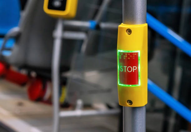 istock Red stop button in public transport. Bus stop button at the request of the passenger. 1206492468