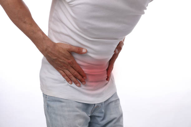 istock Man with stomach pain. Digestive system, Urinary Tract Infection problems. 1206492754