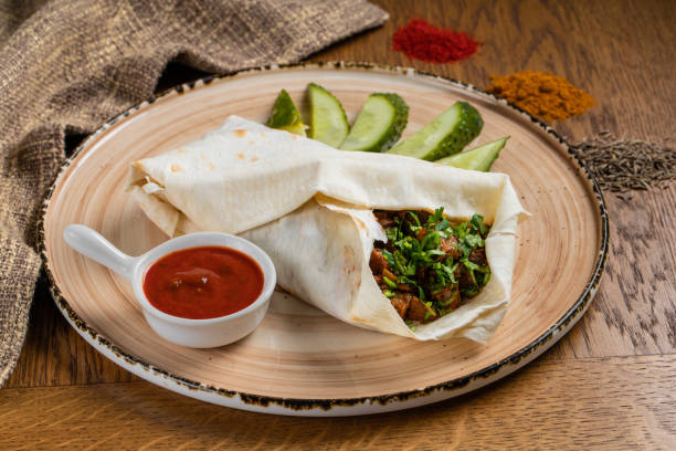 istock A cut kebab, shawarma, with grilled meal and vegetables 1206494089