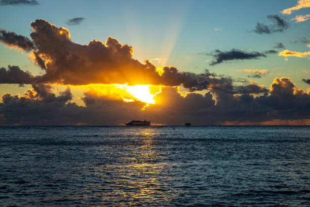 istock Sunset Over Ocean with Cruise Ship Silhouette 1206495193
