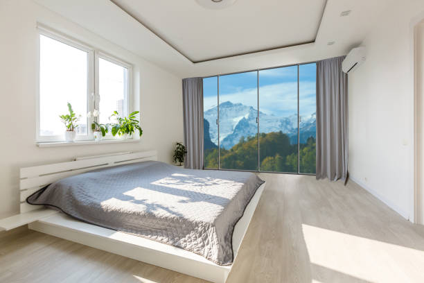 istock panoramic view of nice cozy bedroom with summer outdoor. 1206498224