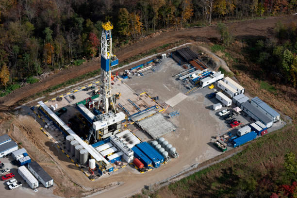 Aerial view of a gas well Aerial view of a gas well northern West Virginia photograph taken Oct 2013 wellhead stock pictures, royalty-free photos & images