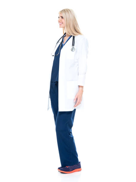 istock Caucasian female doctor standing wearing lab coat 1206503054