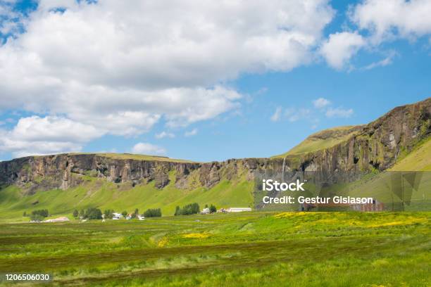 The Farm And Waterfall At Foss A Sidu Seen From Dverghamrar Basalt Columns In Iceland Stock Photo - Download Image Now