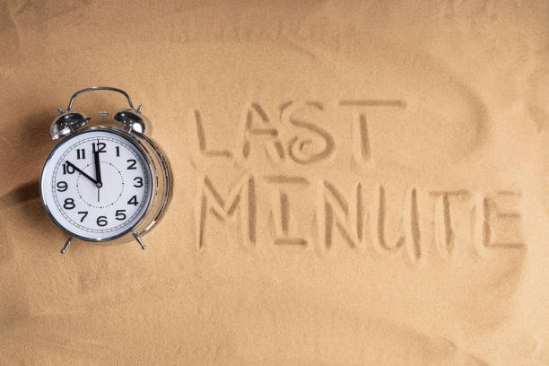 istock Last Minute Alarm Clock And On Beach 1206507519
