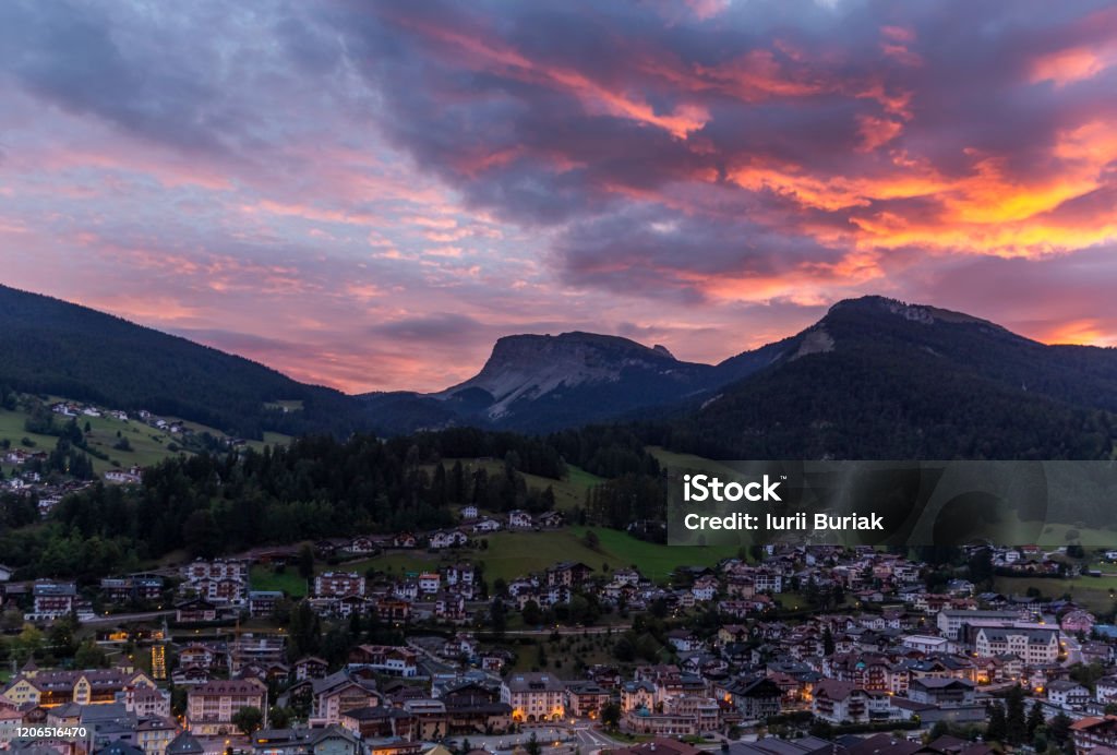 Red evening skies over the Ortisei in Italy Red evening skies over the Ortisei, South Tyrol, Italy Val Gardena Stock Photo