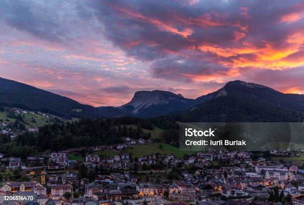 Red Evening Skies Over The Ortisei In Italy Stock Photo - Download Image Now - Val Gardena, Alpine climate, Alto Adige - Italy