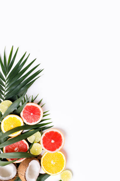 istock Summertime tropical background with exotic fruits 1206526527