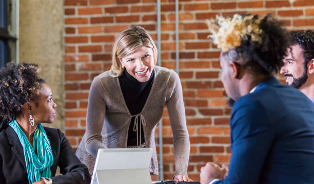 istock Young businesswoman giving presentation 1206531579