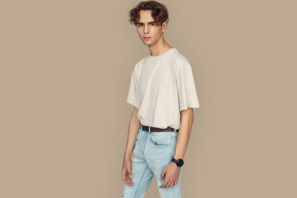 istock Freestyle. Man standing isolated on gray confident 1206532026