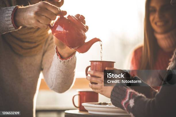 https://media.istockphoto.com/id/1206532109/photo/midsection-of-young-man-pouring-his-friend-a-cup-of-tea-from-a-tea-pot.jpg?s=612x612&w=is&k=20&c=3Cbz54MCVHnfkvqRsDXDK0yGhUuVWgA6FyedZGzpHKg=