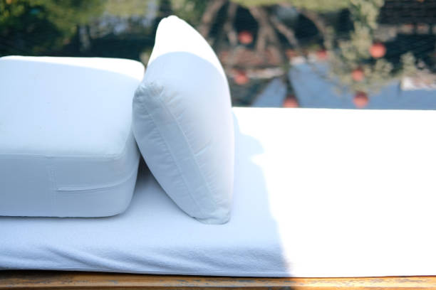 istock sofa bed for relaxing at poolside of swimming pool 1206532508
