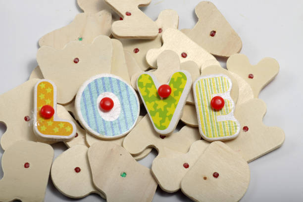 istock wooden letter that can make some words such as, win, love, mix 1206533633