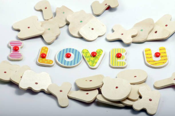 istock wooden letter that can make some words such as, win, love, mix 1206533663