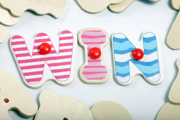 istock wooden letter that can make some words such as, win, love, mix 1206533836