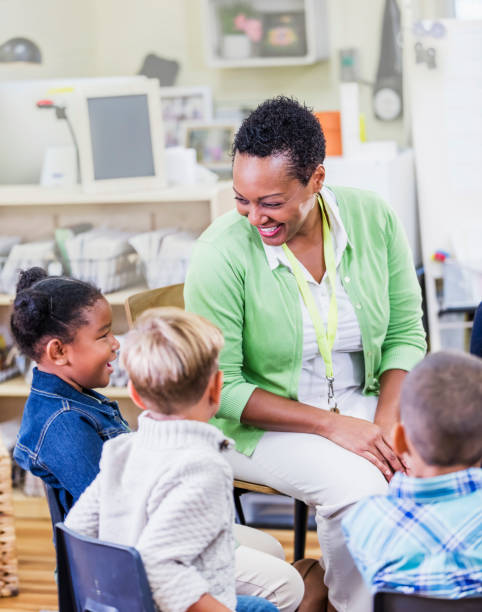 istock African-American teacher, young children in class 1206534741