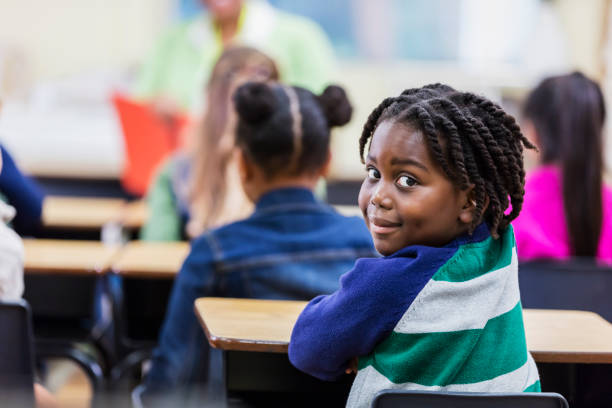 istock African-American boy in elementary school classroom 1206534747