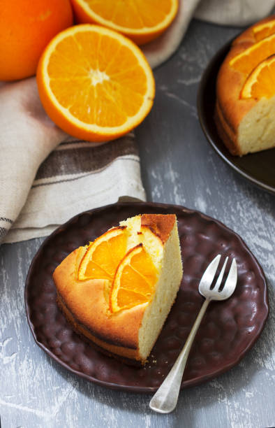 istock Orange cake with slices of orange on a concrete background. 1206536738