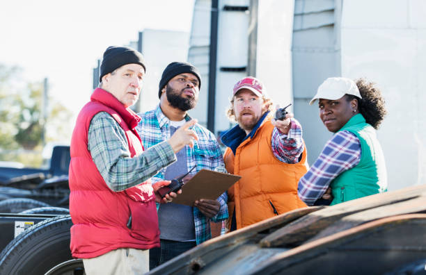 istock Workers at trucking company having meeting 1206536798