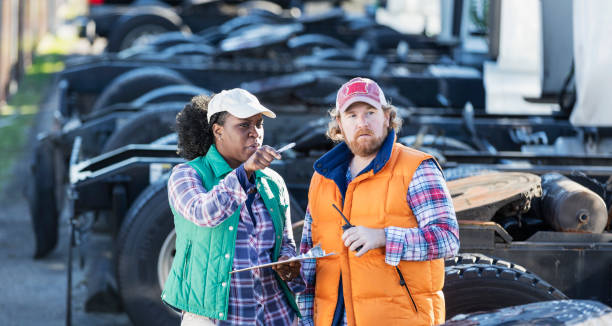istock Workers at trucking company 1206536969