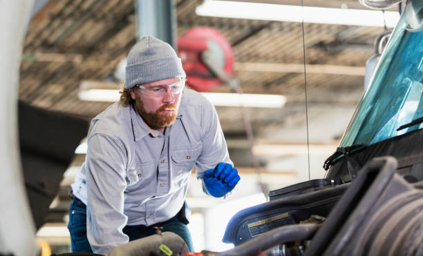 istock Mechanic repairing semi-truck 1206538323