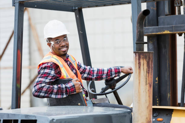 istock African-American man operating forklift 1206538481