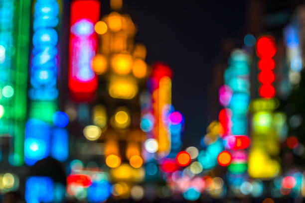istock Shanghai, China - February 13, 2018: Neon signs lit on Nanjing Road. 1206539575