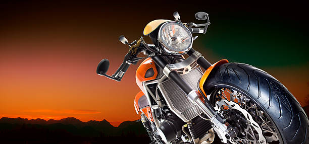 istock Motorcycle with an orange night background 120654057