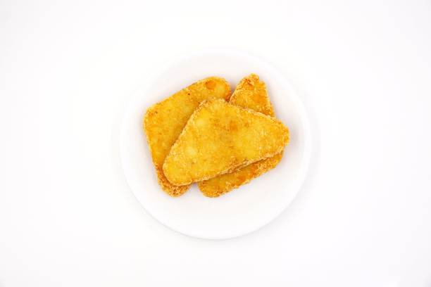 istock Fried golden potato hash browns 1206540739