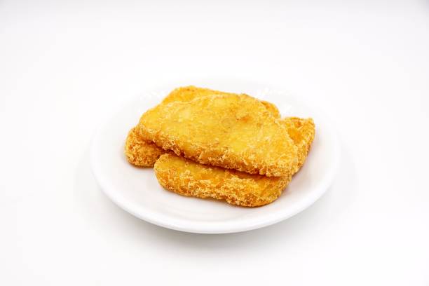 istock Fried golden potato hash browns 1206540742