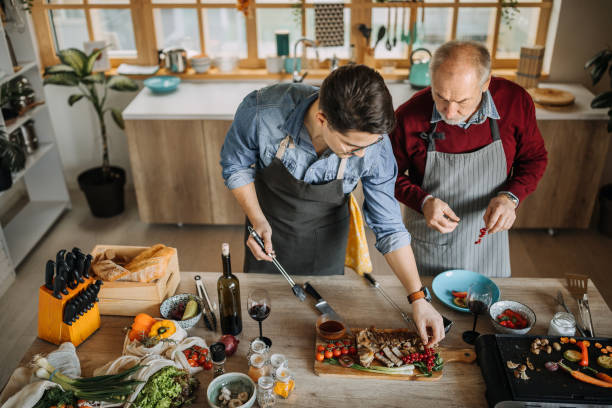 istock Father And Son Enjoying cooking together 1206540760