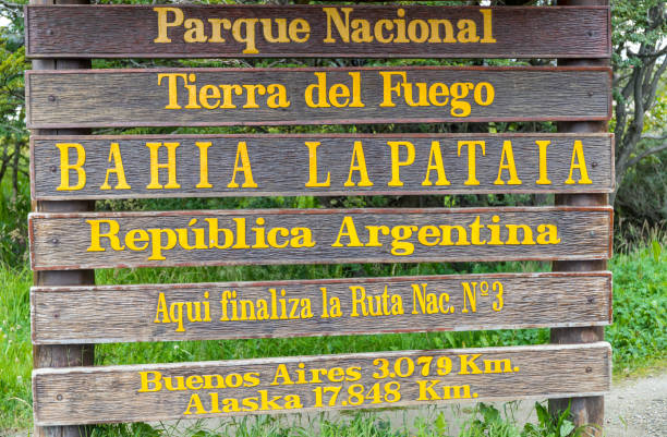 Land of Fire sign The Tierra Del Fuego sign marking the beginning of the road that transverses North and South America ending in Alaska USA. tierra del fuego national territory stock pictures, royalty-free photos & images