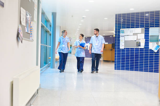 istock medical students in hospital corridor 1206541618