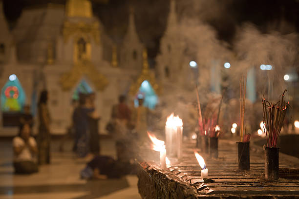 istock Praying people at Schwedagon pagoda 120654986