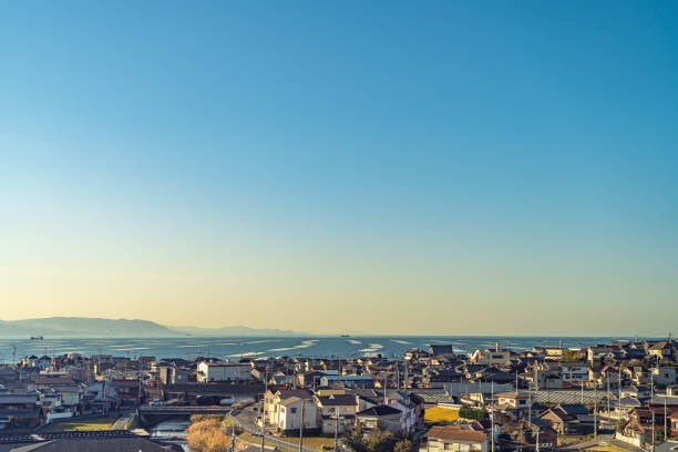 Akashi city cityscape in sun set time with clear blue sky background. Hyogo Prefecture, Japan