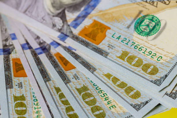 istock Currency US dollar banknotes close-up 1206563829