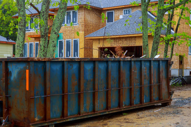 Construction trash dumpsters in an metal container, home house renovation.