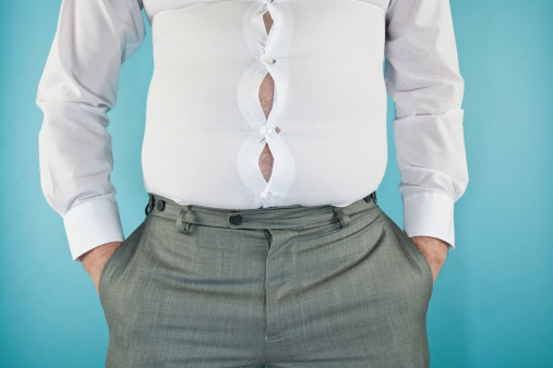 Overweight Businessman wearing a very tight shirt.