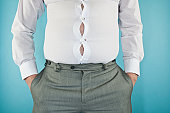 Overweight Businessman with tight shirt