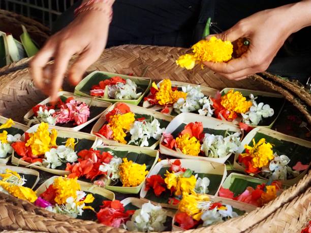 istock Making Flower Offerings on a Market Stall in Ubud - Bali 1206568894