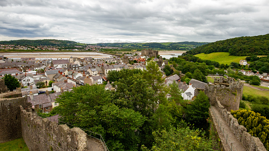 Aerial view of Conwy Castle and River Conwy in Wales from the medieval town walls