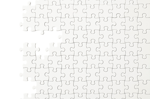 Blank jigsaw puzzle isolated on white with clipping path.