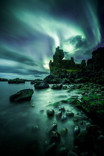 istock Aurora Borealis (Northern Lights) above londrangar rock formation 1206575396
