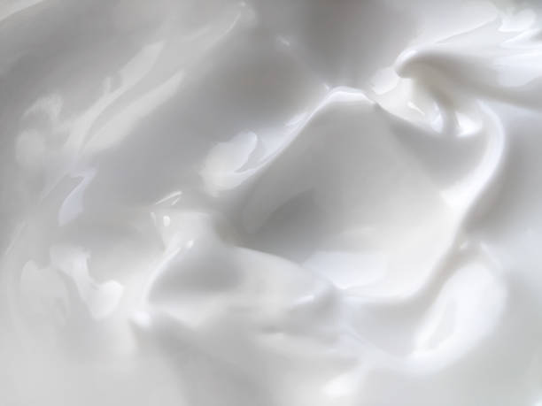 istock Texture of white cream for care.Beauty background. 1206582073