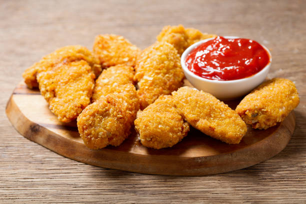 istock fried chicken with ketchup 1206585297