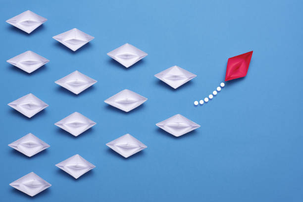 istock Leadership Concept with Paper Ship 1206585737