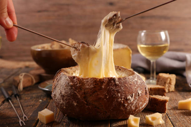 istock cheese fondue in bread bowl with wine 1206588140